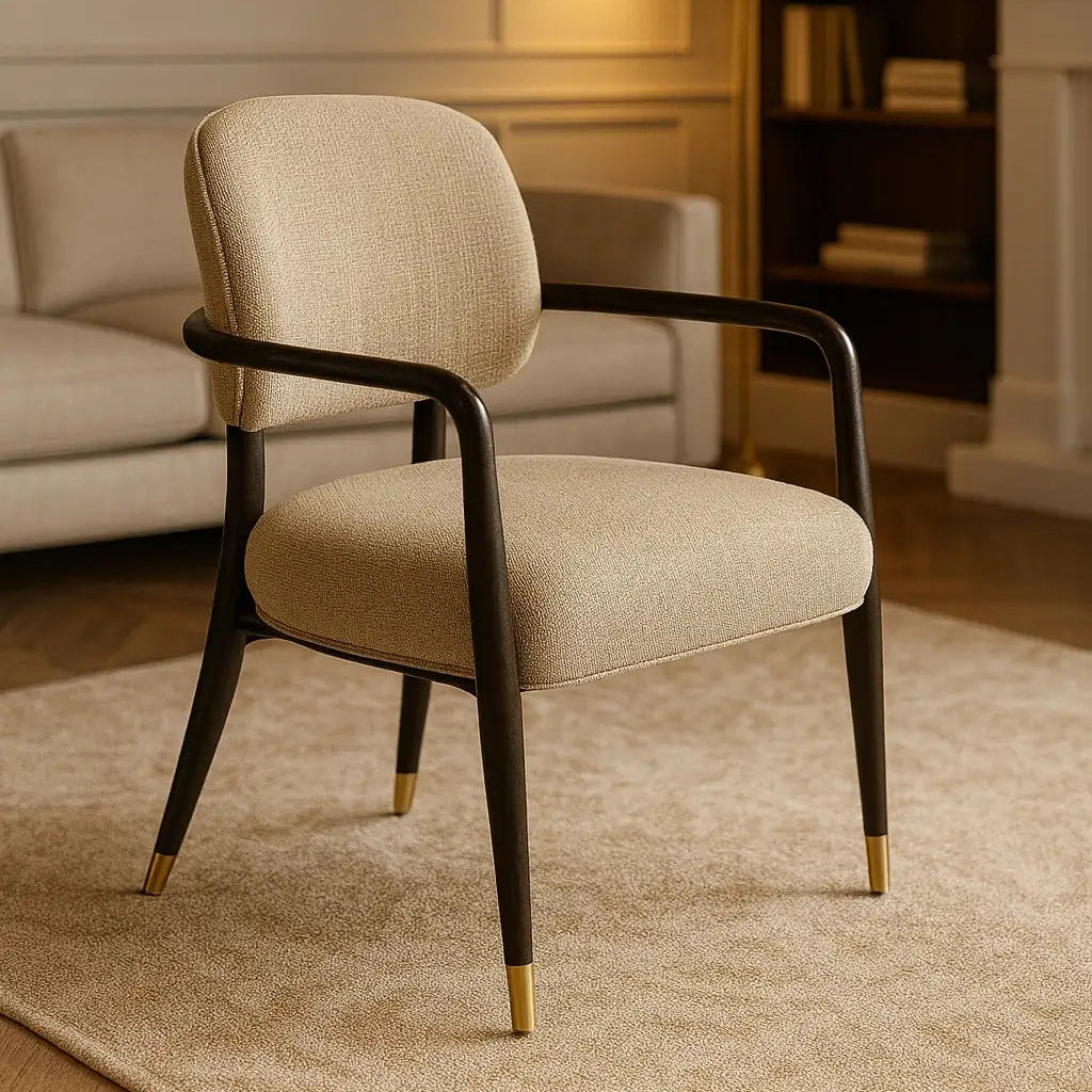 Beige armchair with black metal frame in a living room setting
